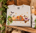 Cozy Halloween Bookshelf Gildan Crewneck